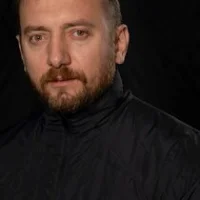 Джихан Талай